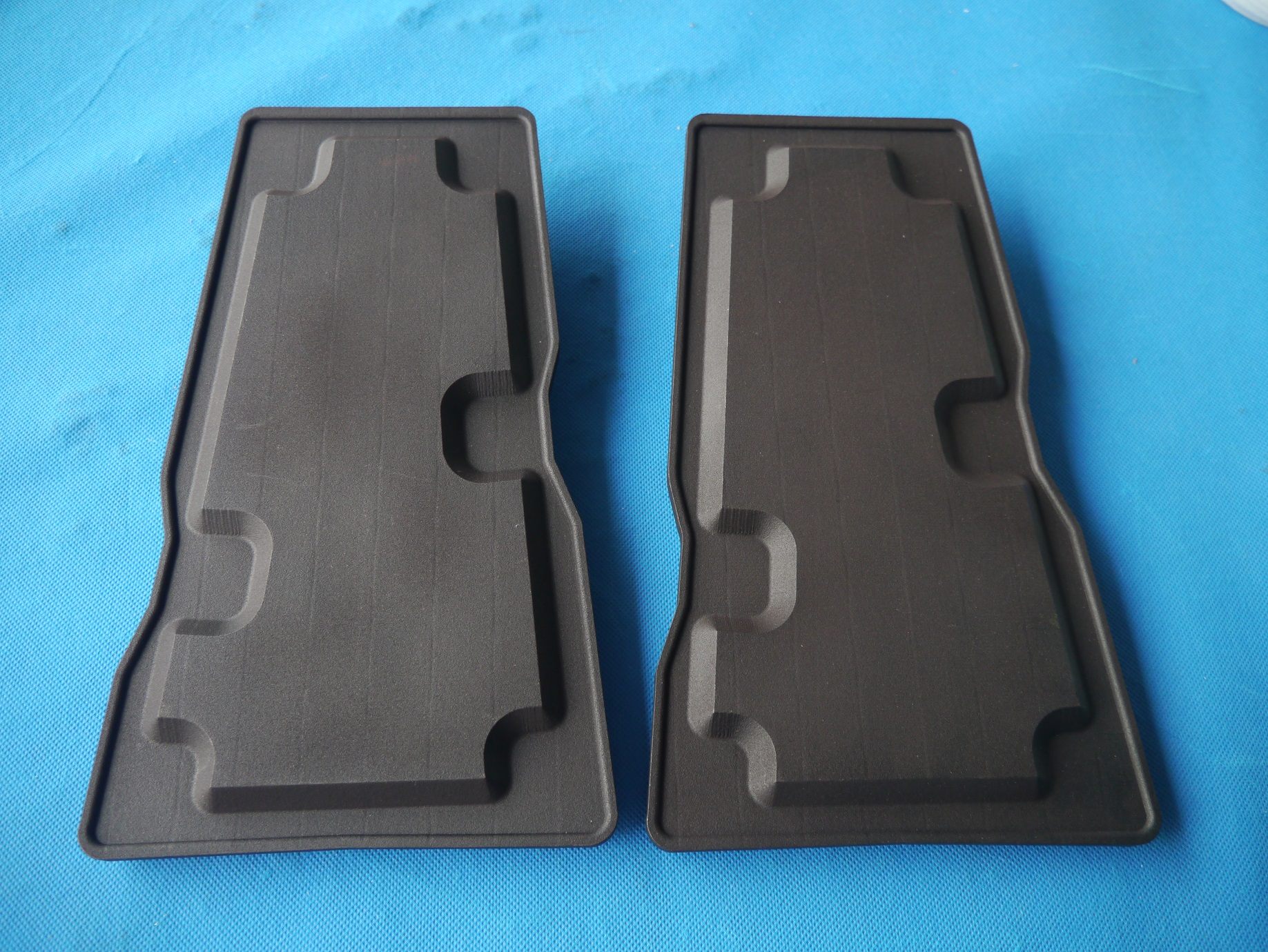 Black ABS-like resin 3D-printed part with smooth surface finish